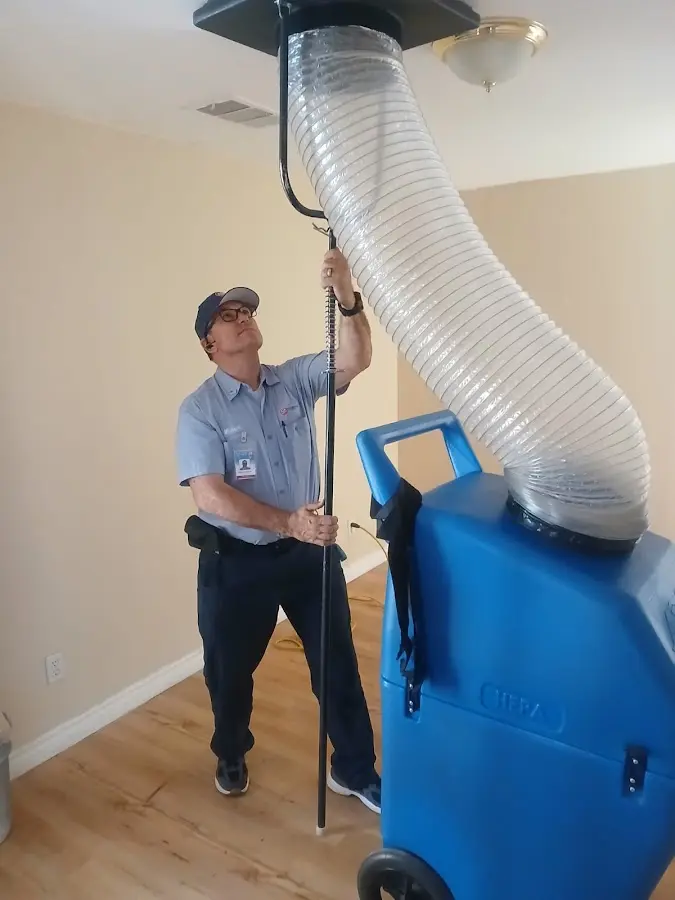HVAC Installation technician using HEPA equipment in Hingham